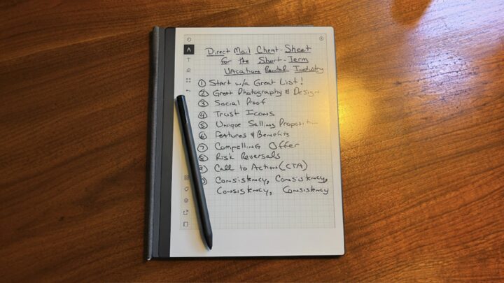 Brooke Pfautz's note book on a wooden table, showing a list of Direct Mail Cheat Sheet tips